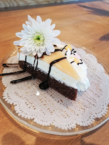 Opinii despre Kirchenwirt Stadtalm în St. Johann im Pongau - Gastronomie und Hotellerie