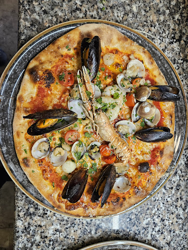 Opinii despre Osteria Pizzeria Vino e Altro im Kulturcafé în St. Andrä-Wördern - Gastronomie und Hotellerie