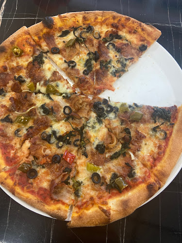 Opinii despre Uni Pizza în Linz - Gastronomie und Hotellerie