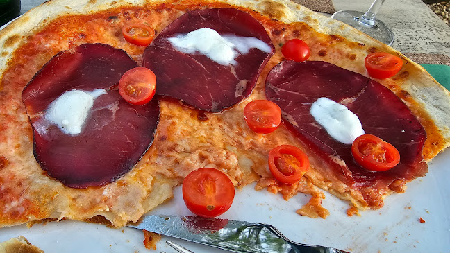 Opinii despre Pizzeria Magno Rif am Golfplatz în Rif - Gastronomie und Hotellerie