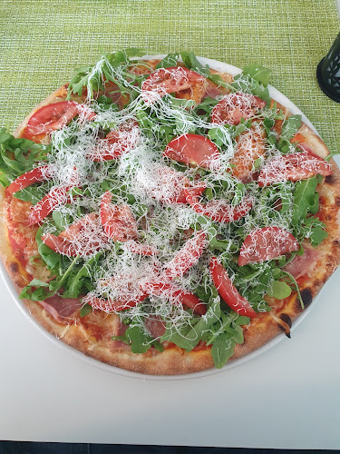 Opinii despre Pizzeria Treff - Tirol în Weißenbach am Lech - Gastronomie und Hotellerie