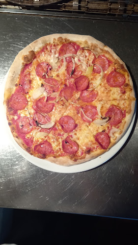 Pizzeria Magno Rif am Golfplatz - Gastronomie und Hotellerie