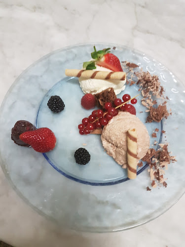 Opinii despre Asado's Steakhouse, Bar & Lounge în Kirchberg in Tirol - Gastronomie und Hotellerie