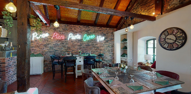 Pizzeria Magno Rif am Golfplatz - Gastronomie und Hotellerie