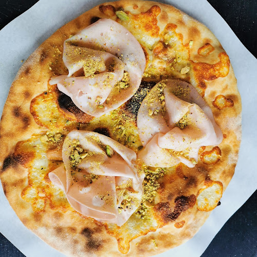 Magari Pizza - Gastronomie und Hotellerie