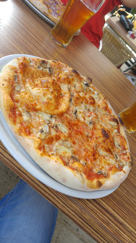 Opinii despre Papa Roy Pizzeria Restaurant Café în Bischofshofen - Gastronomie und Hotellerie