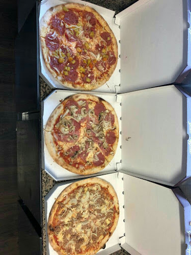 Pizzeria Happy - Gastronomie und Hotellerie