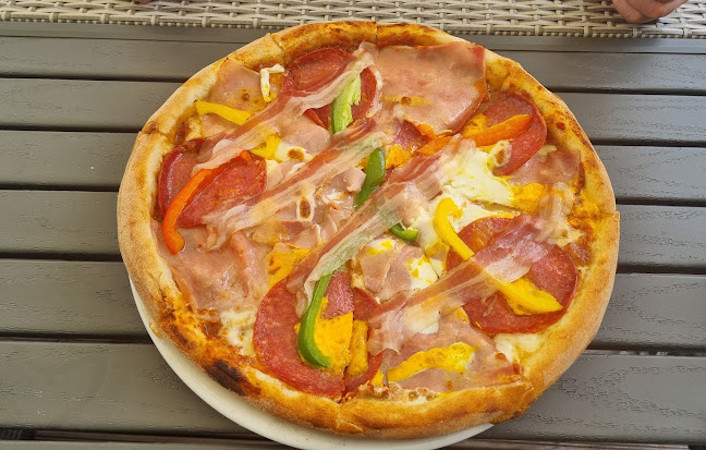 Prima Pizzeria - Gastronomie und Hotellerie